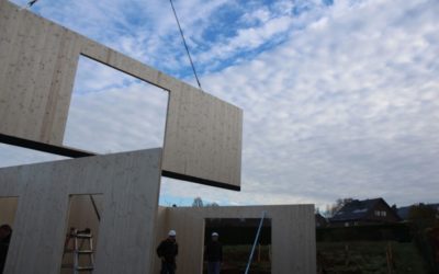 Maison en bois et revêtement en plaquette de pierre